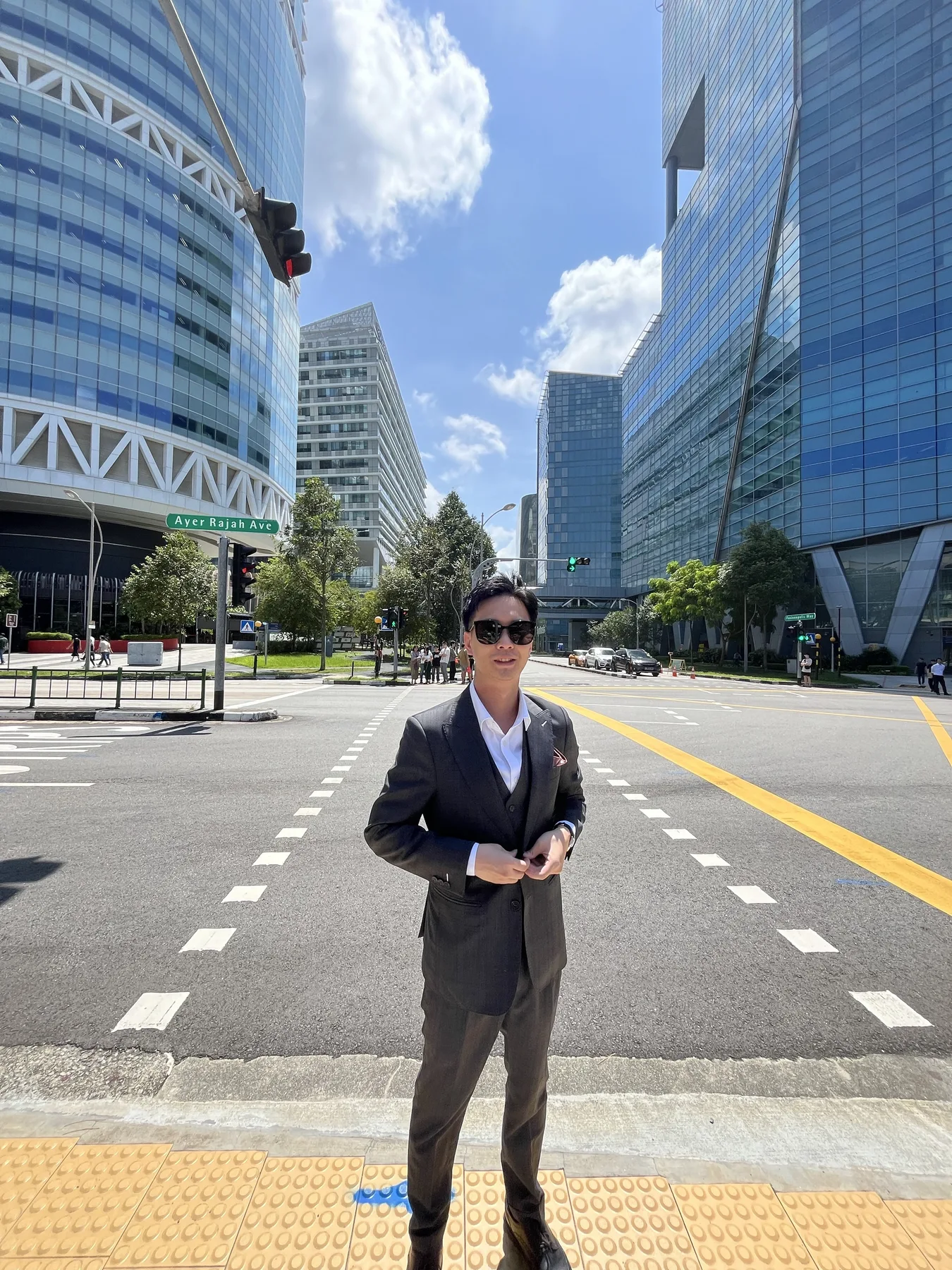 Kelvin Ngo standing on Ayer Rajah Avenue in Singapore.